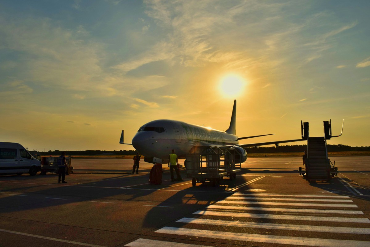 Airliner on the tarmac at sunrise, ready for an early departure